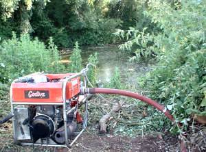 Fire pump draws water from pond