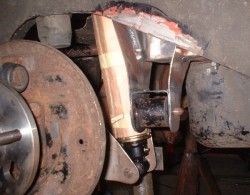 Panhard rod mounting to body