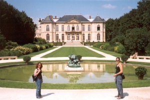 Ornamental garden in front of palace with naked statues