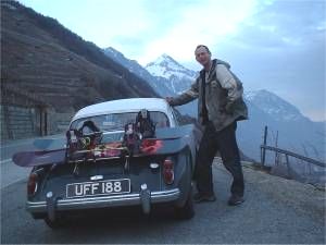 Chris and the MGA with snowboards on the back